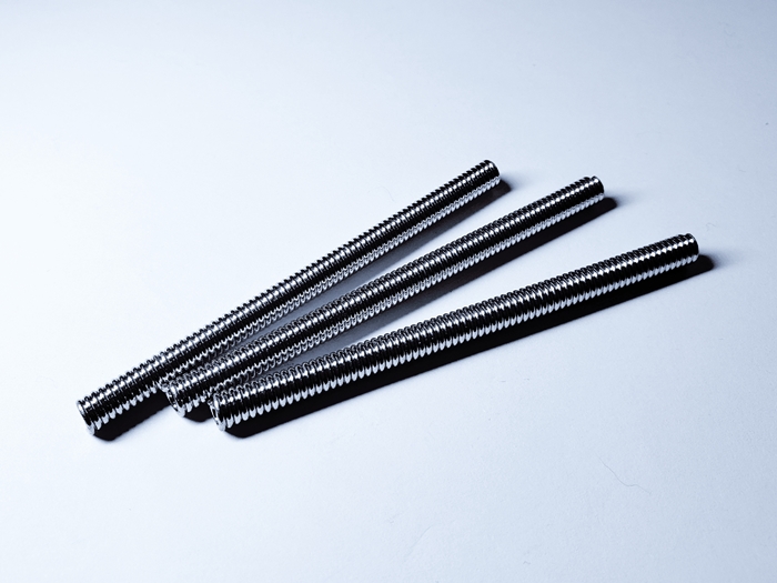 Long black compression springs for industrial mechanisms