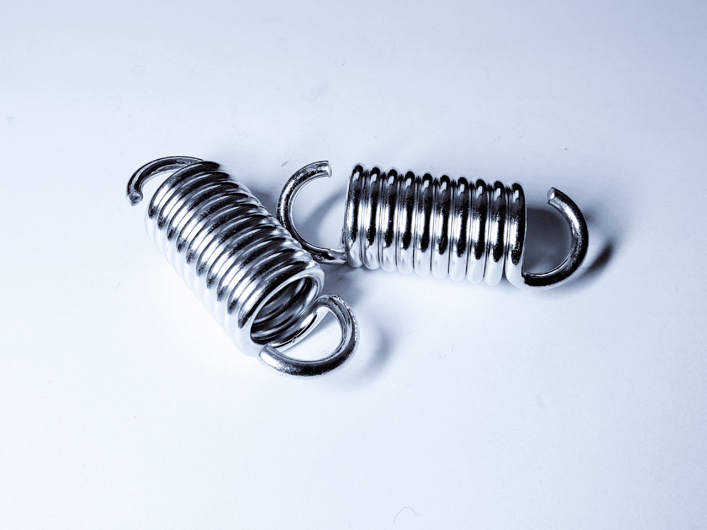 Extension spring pair with side loop hooks