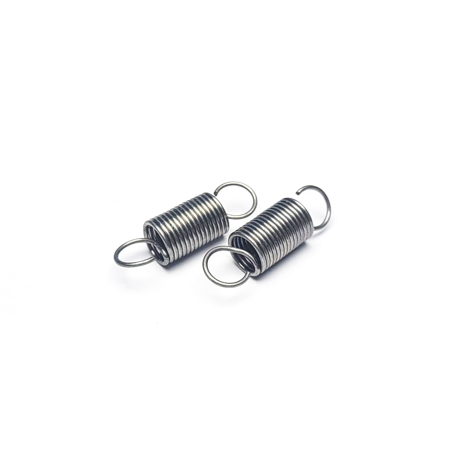 Short extension spring pair with round loops