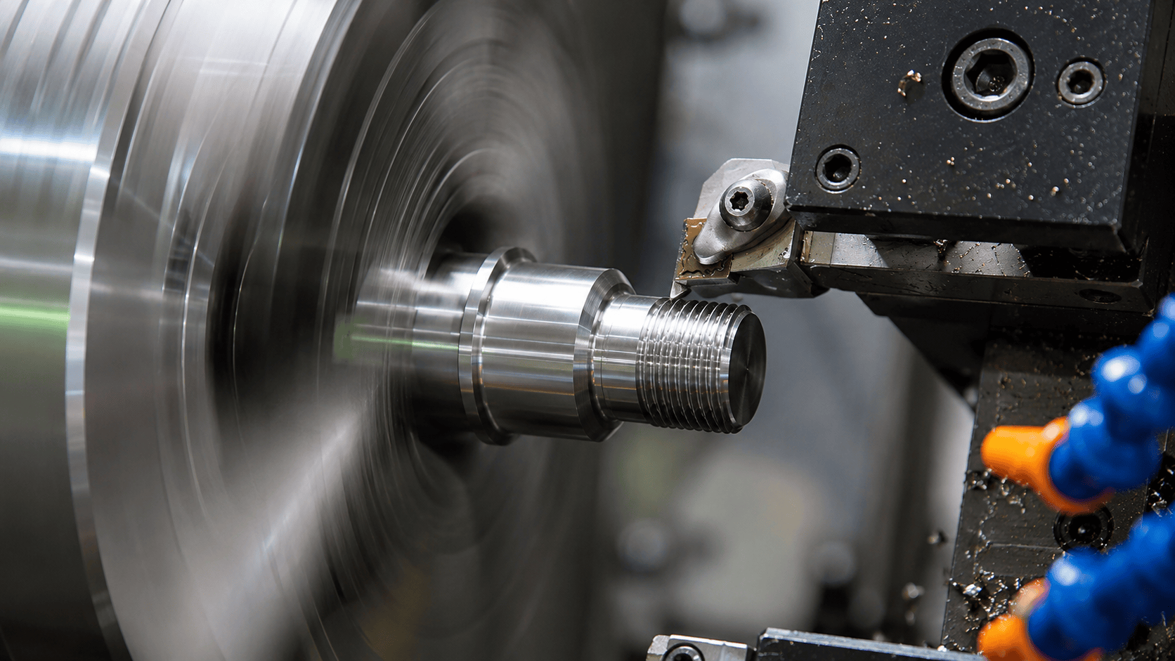 Thread cutting operation on a turned metal part