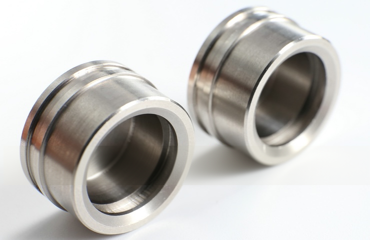Precision turned grooved bushings