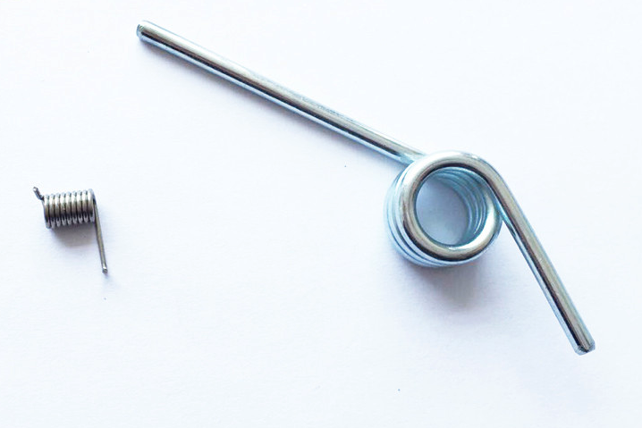 Custom torsion spring with long straight leg