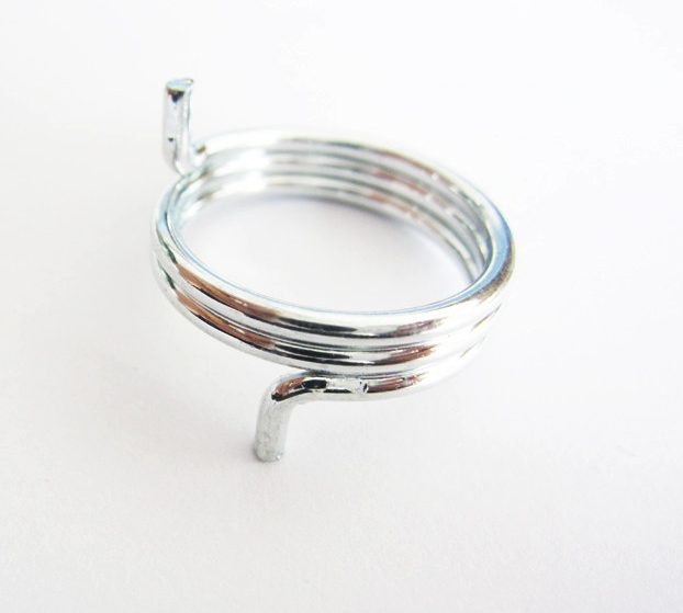 Polished torsion spring close up